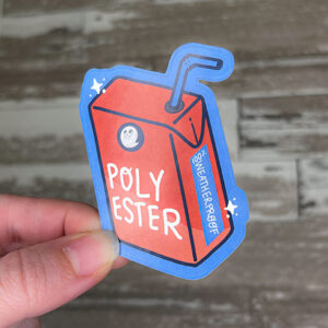 hand holding a die cut sticker printed on polyester sticker paper